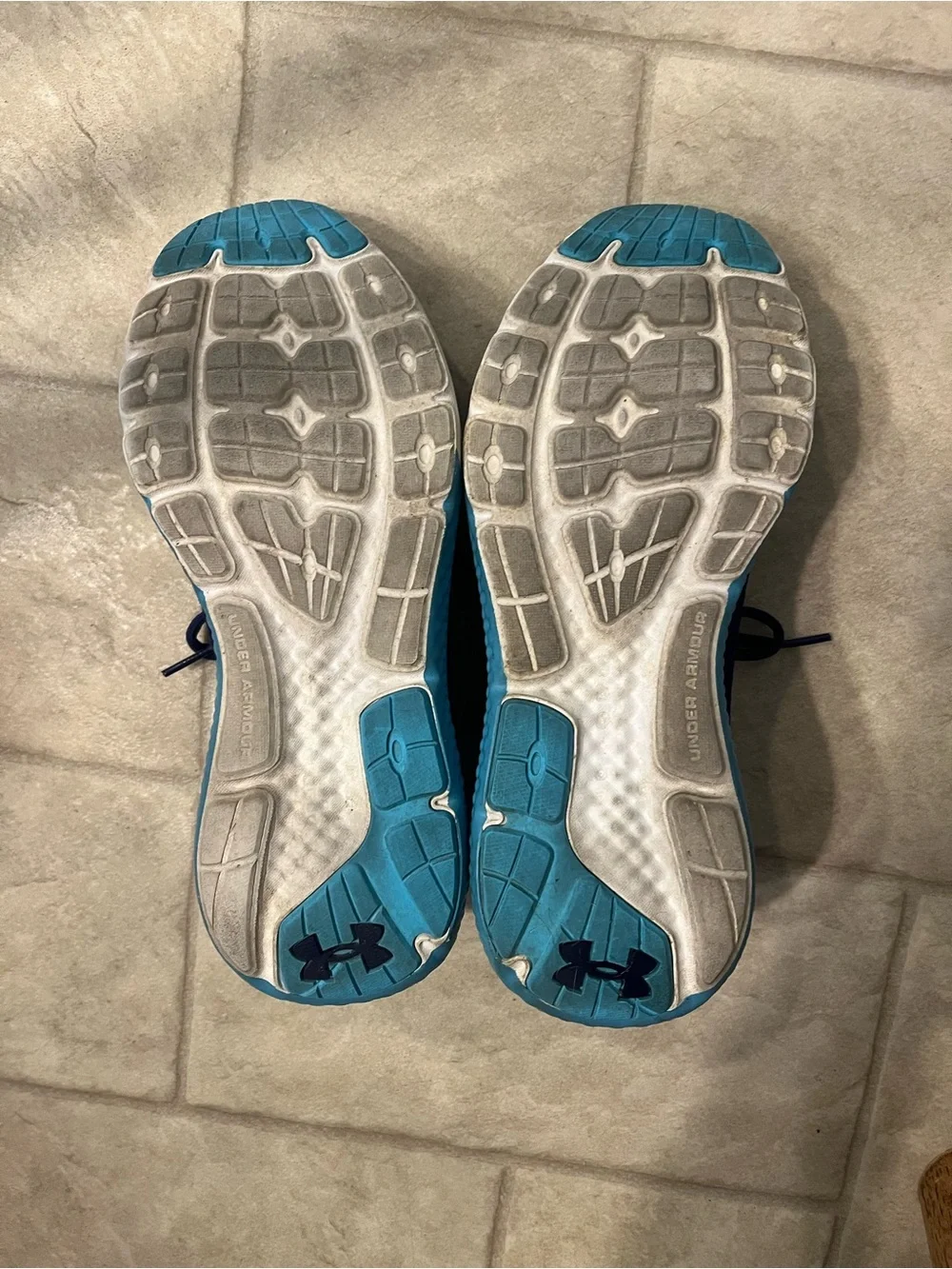 Under Armour Charged Rogue running shoes. Purple and teal. 6y or 7.5-8 women.